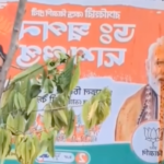Man cleans gutka-stained PM Modi banner on Bengal street